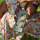 Wild Life Botanicals ultra low alcohol sparkling wine in a can, nude and blush, mood-boosting botanicals, vitamins and minerals. Non-alcoholic sparkling wine in a can.